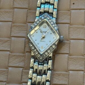 Elegant silver tone diamond face quartz cocktail watch